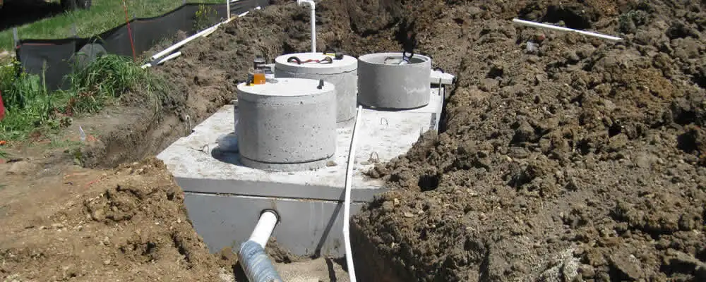 Septic system repair and installation site with tank access ports in Philadelphia, PA