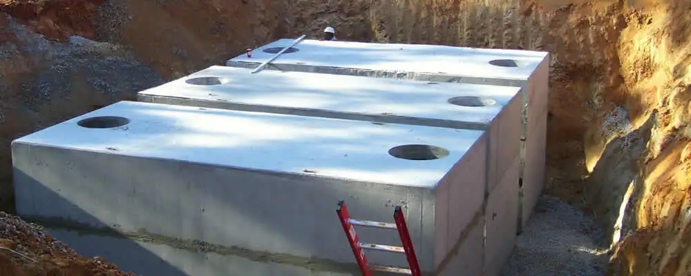 Septic tank installation site with a newly placed concrete tank in Philadelphia, PA